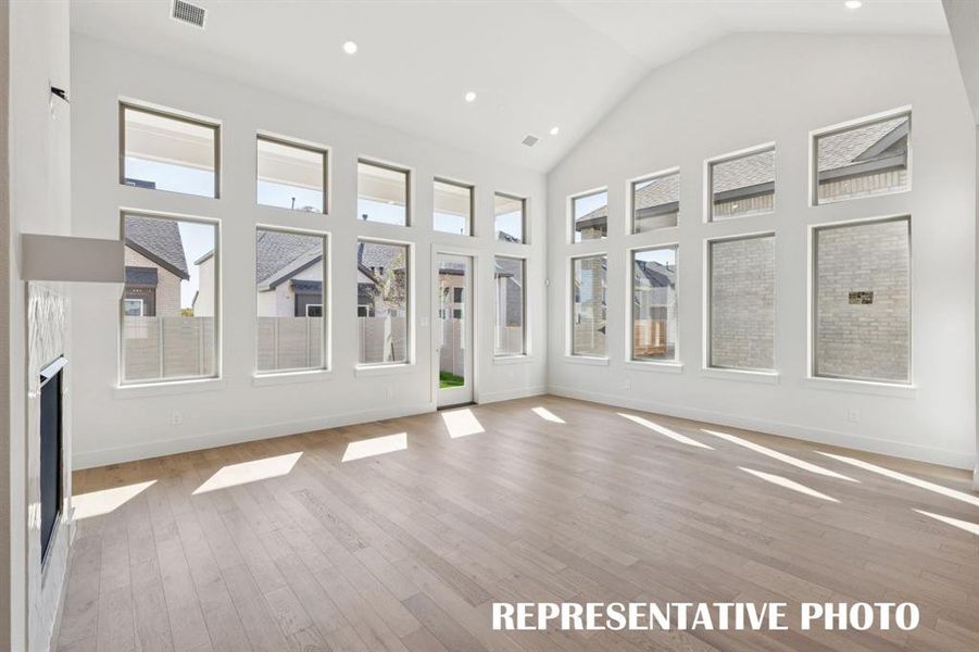 You'll love calling this light filled family room your own!  REPRESENTATIVE PHOTO