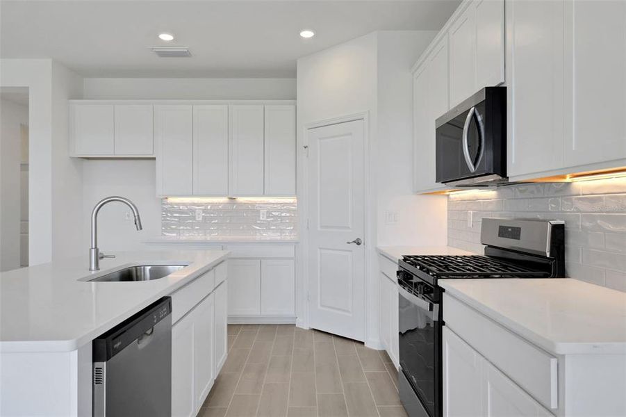 Furnished interior view inside a new home in Brystol North at Wylder, Port St. Lucie (Image 10).