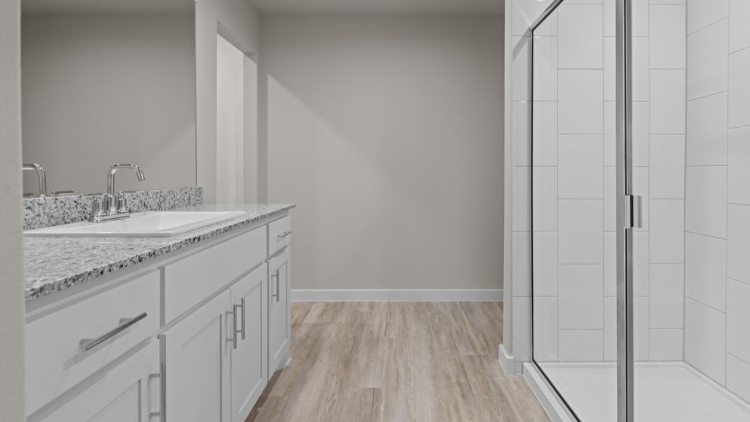 Representative furnished interior of a home built from the CAMDEN by D.R. Horton in Homestead at Parks Bell Ranch, Odessa (Image 13).
