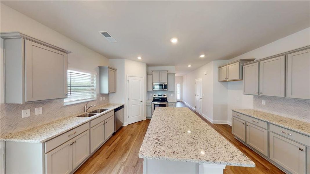 Furnished interior view inside a new home in Mirror Lake at South Harbour, Villa Rica (Image 13).