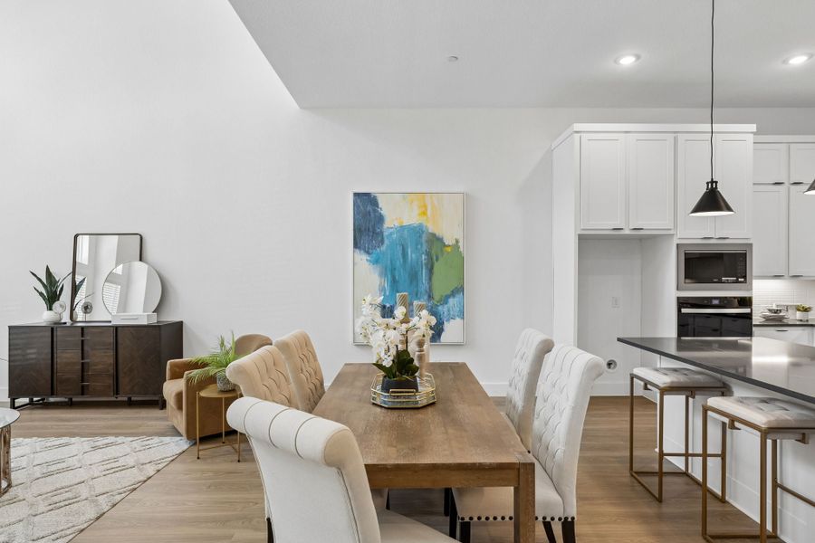 Representative furnished interior of a home built from the Roosevelt by Centre Living Homes in Newman Village Townhomes, Frisco (Image 31).