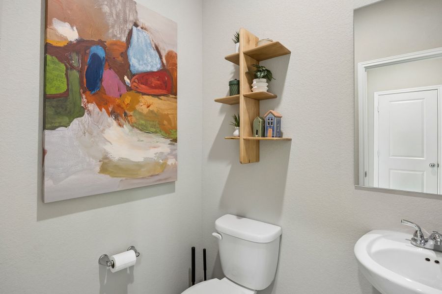 Half Bath in the Oak home plan by Trophy Signature Homes – REPRESENTATIVE PHOTO