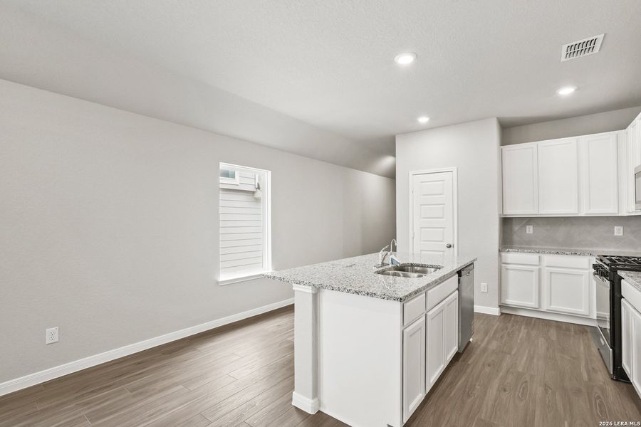 Furnished interior view inside a new home in Hickory Ridge, Elmendorf (Image 13).