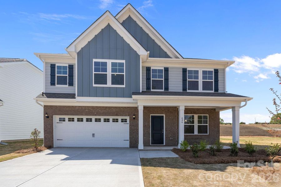 Front exterior of a new home in McFarland Estates, York, SC, highlighting curb appeal (Image 2). Front exterior of a new home in McFarland Estates, York, SC, highlighting curb appeal (Image 2).