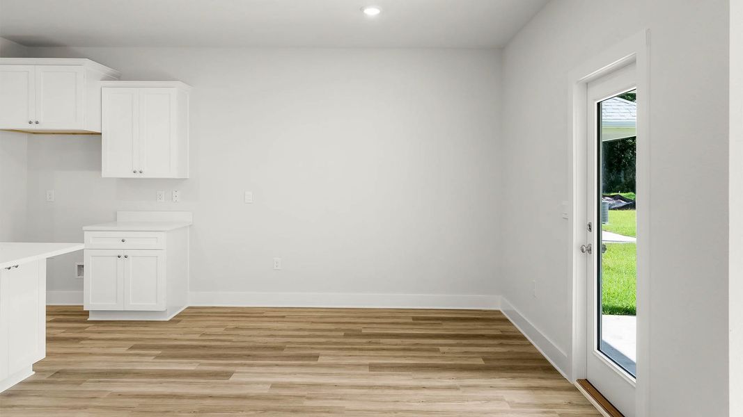 Representative unfurnished interior of a home built from the The Rhett by D.R. Horton in Buffer Farms, Port Saint Joe (Image 12).