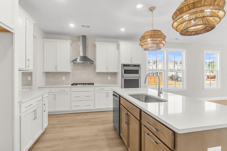 Furnished interior view inside a new home in Tidewater at Lakes of Cane Bay, Summerville (Image 6).