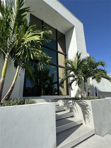 Exterior details and patio area of a home in , Longboat Key (Image 52).