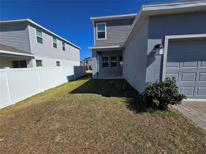 Exterior details and patio area of a home in Rhett's Ridge, Apopka (Image 4).