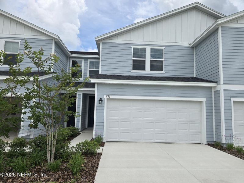 Front exterior of a new home in , Middleburg, FL, highlighting curb appeal (Image 12). Front exterior of a new home in , Middleburg, FL, highlighting curb appeal (Image 12).