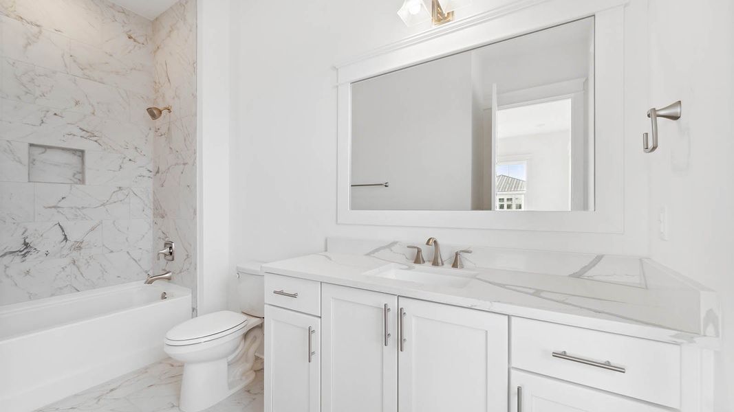 Representative furnished interior of a home built from the Cayman by D.R. Horton in Parkside, Santa Rosa Beach (Image 17).