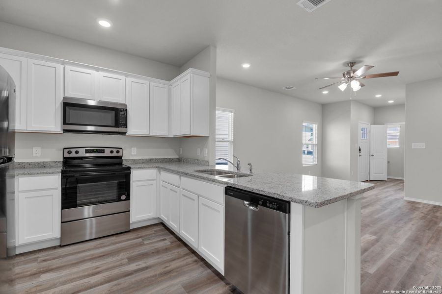 Furnished interior view inside a new home in , San Antonio (Image 2).