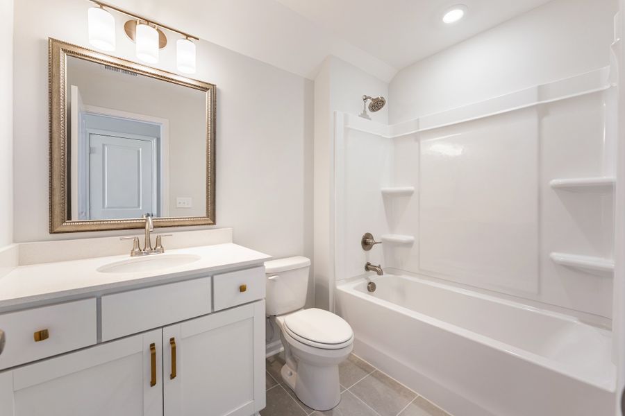 Furnished interior view inside a new home in Landing at Pine Lake, Anderson (Image 13).