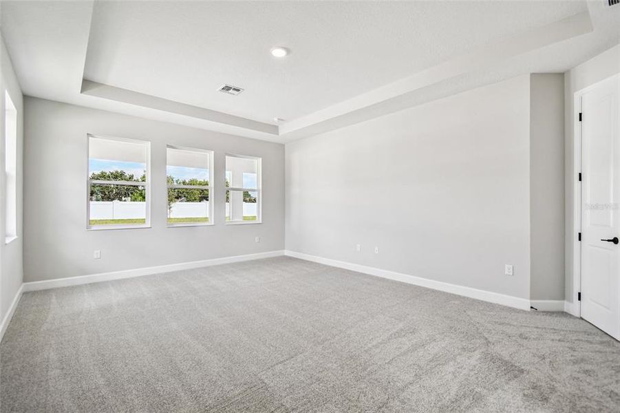 Spacious, unfurnished interior of a new home in Solace at Corner Lake, Orlando (Image 36).