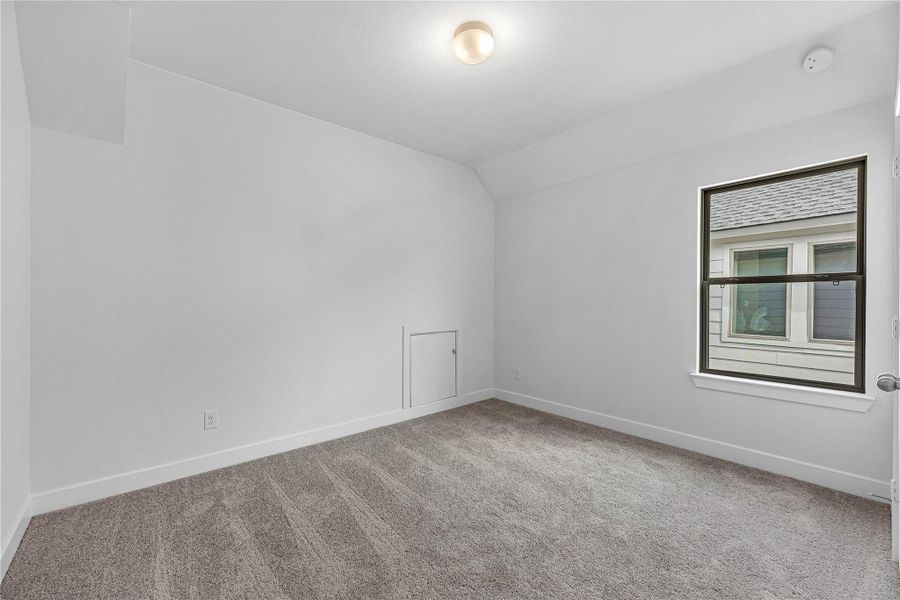 Spacious, unfurnished interior of a new home in Sunterra, Katy (Image 19).