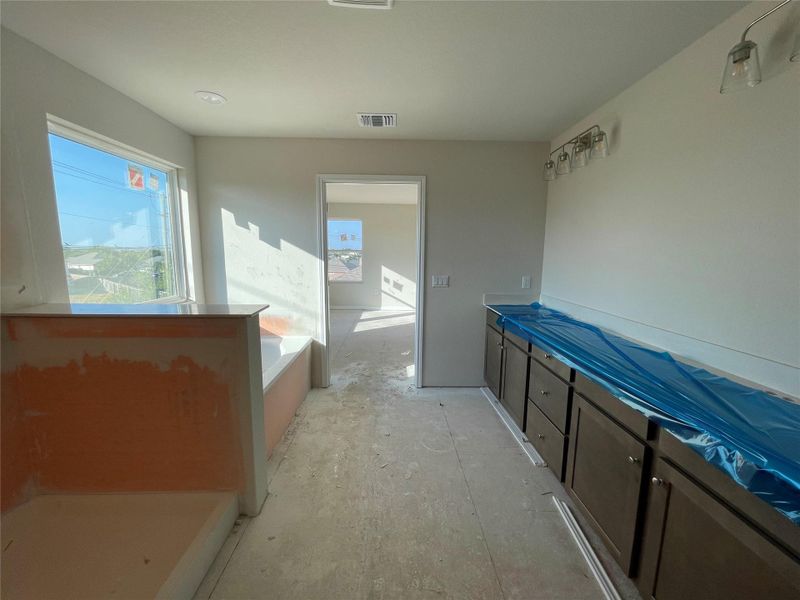 Furnished interior view inside a new home in Covered Bridge, Hutto (Image 6). Furnished interior view inside a new home in Covered Bridge, Hutto (Image 6).