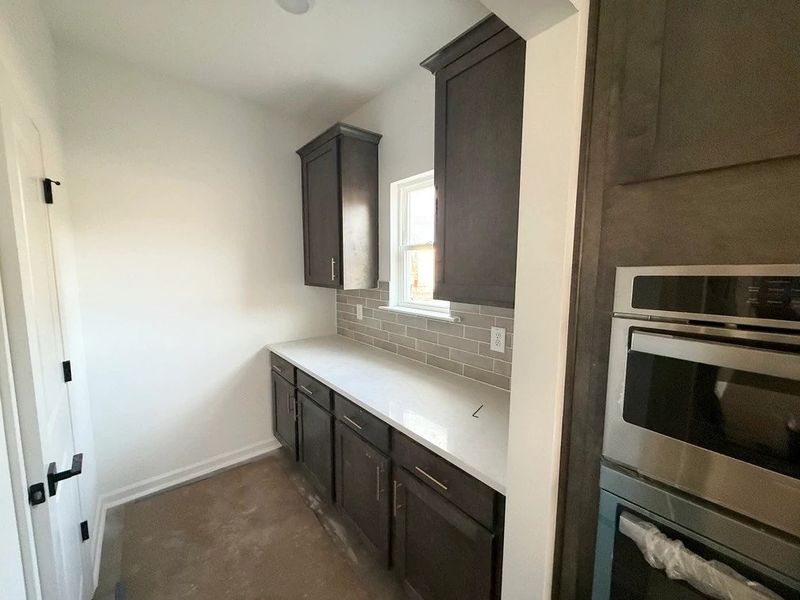 Butler’s Pantry featuring AW Collection® Oxford - Elegant functionality with natural flow.