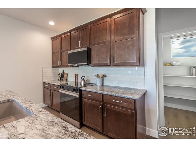 Furnished interior view inside a new home in Wilson Commons, Loveland (Image 15).