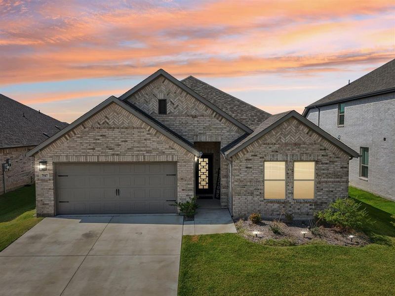 Front exterior of a new home in , Venus, TX, highlighting curb appeal (Image 20).