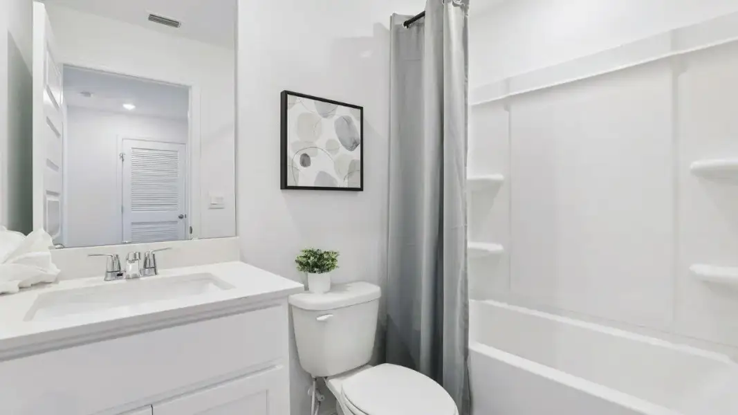 Furnished interior view inside a new home in Atria at Ridgewood Lakes, Davenport (Image 24).