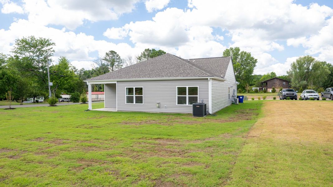 Front exterior of a new home in Sweet Briar, Ooltewah, TN, highlighting curb appeal (Image 21).