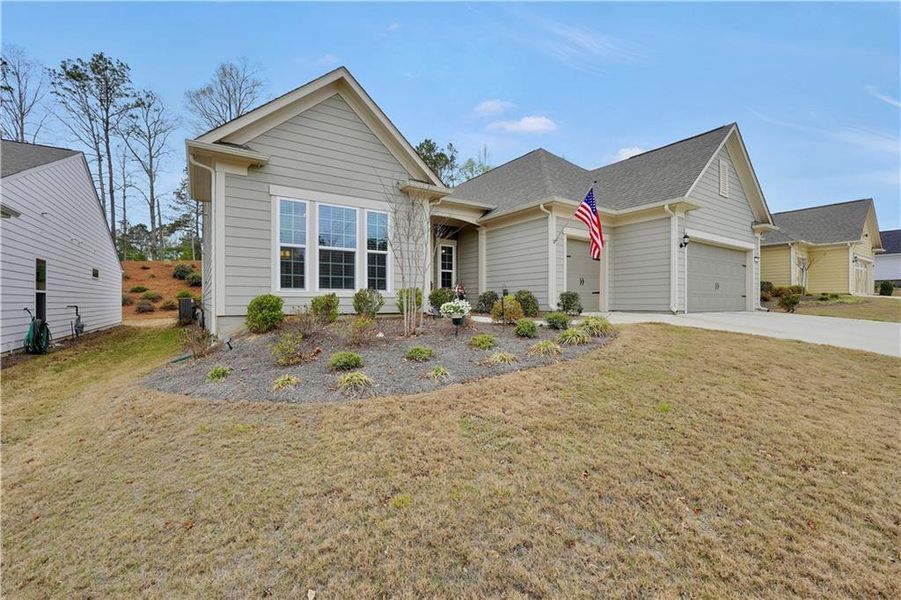 Front exterior of a new home in , Griffin, GA, highlighting curb appeal (Image 23).