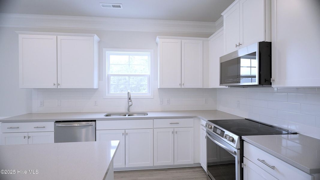 Furnished interior view inside a new home in Palmetto Creek, Bolivia (Image 4).