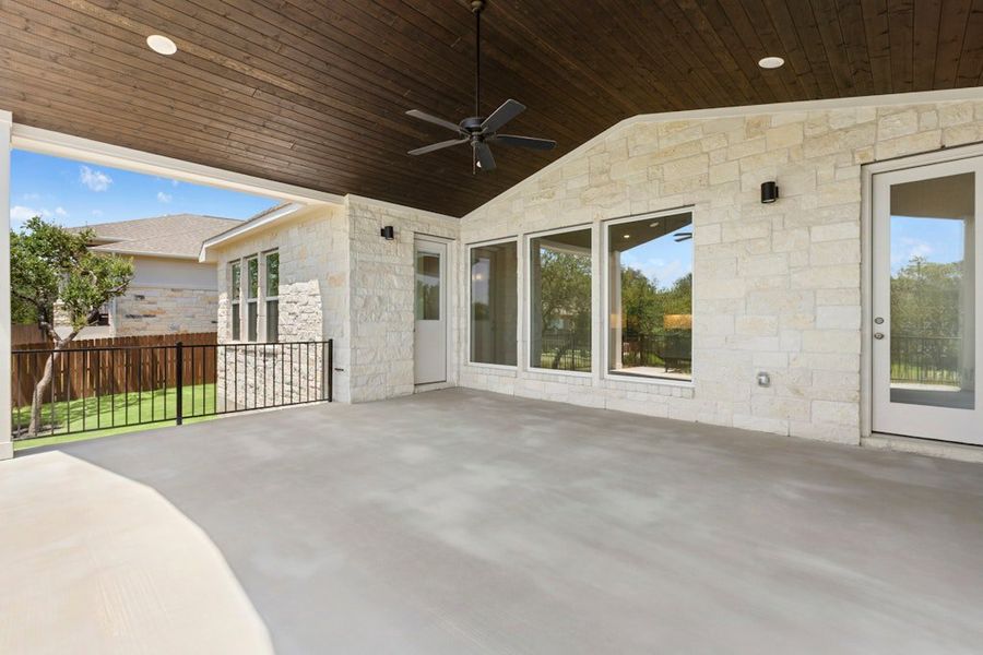 Exterior details and patio area of a home in Riverstone, Georgetown (Image 3).