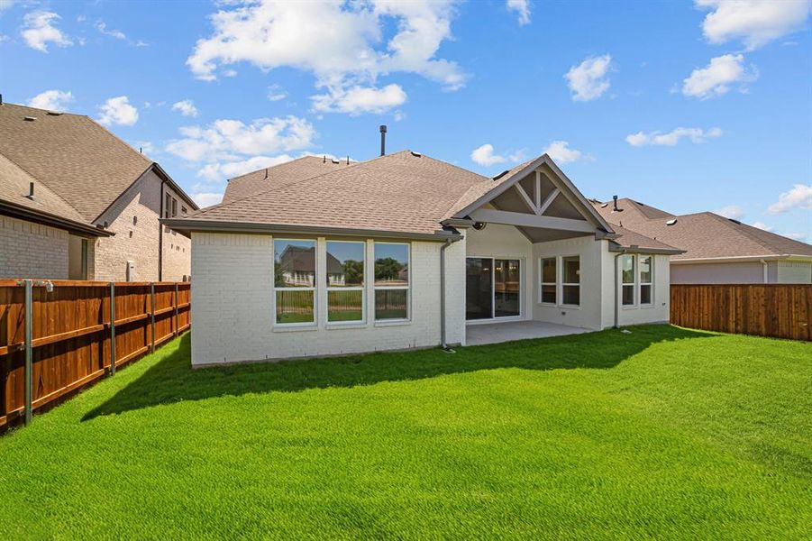 Exterior details and patio area of a home in Wellington, Haslet (Image 22).