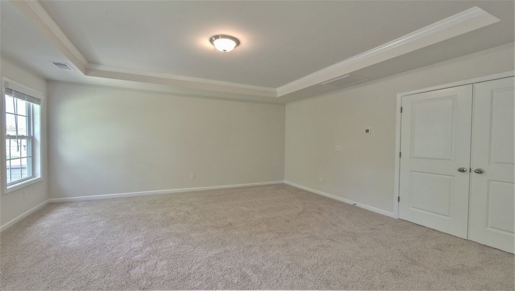 Spacious, unfurnished interior of a new home in Reserve at Tap Root Farms, Fletcher (Image 25). Spacious, unfurnished interior of a new home in Reserve at Tap Root Farms, Fletcher (Image 25).