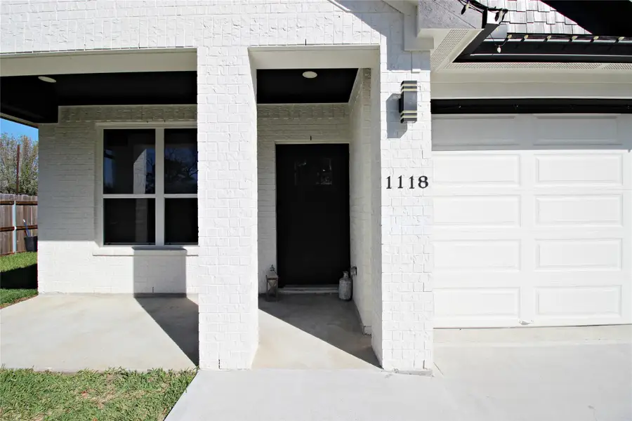 Exterior details and patio area of a home in , Baytown (Image 3).