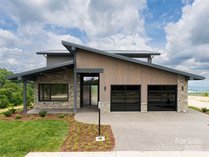 Front exterior of a new home in , Hendersonville, NC, highlighting curb appeal (Image 25).