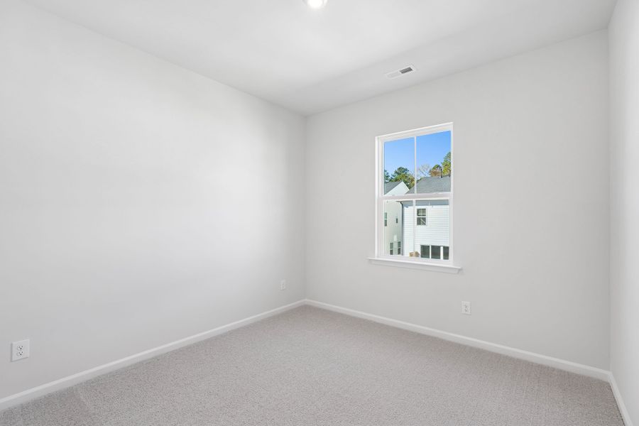 Representative unfurnished interior of a home built from the Nola by Tri Pointe Homes in The Grove at Latta Park, Durham (Image 15).
