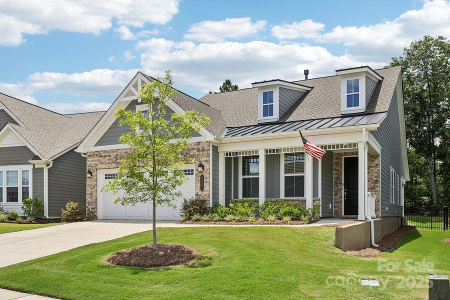 Front exterior of a new home in Handsmill on Lake Wylie, York, SC, highlighting curb appeal (Image 19).