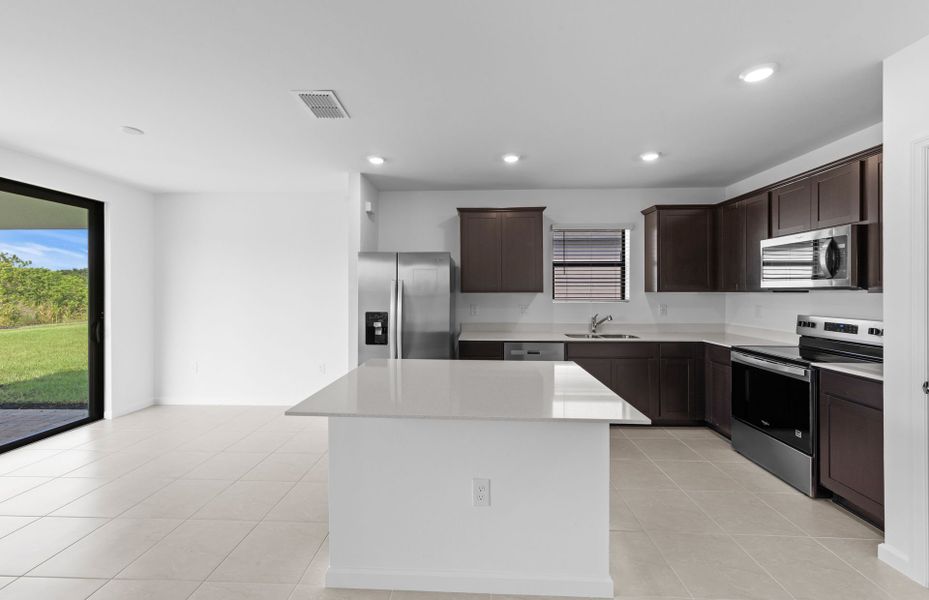 Furnished interior view inside a new home in Caloosa Cove, Labelle (Image 8).