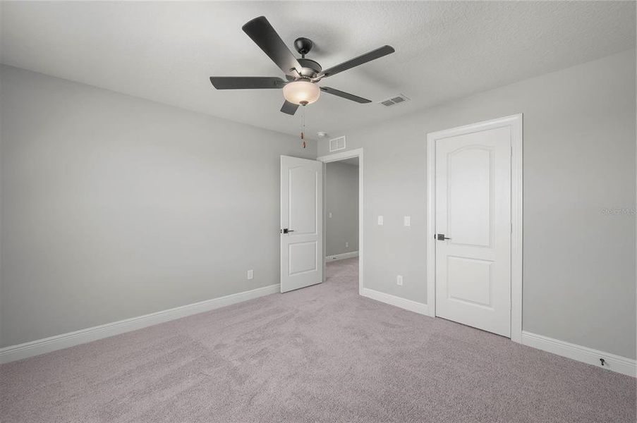 Spacious, unfurnished interior of a new home in Gum Lake Preserve, Lake Alfred (Image 18).