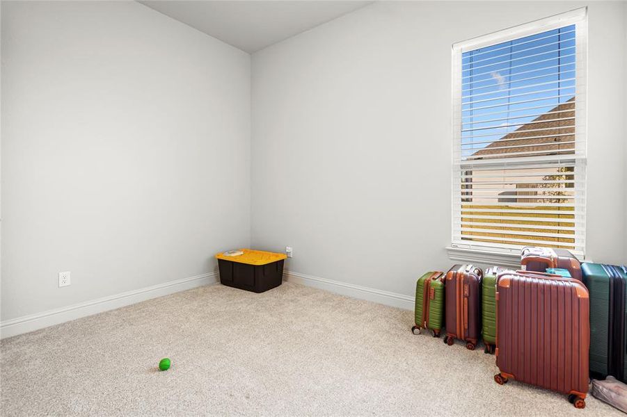 Bedroom with Jack and jill shared toilet and showe baseboards and carpet flooring Bedroom with Jack and jill shared toilet and showe baseboards and carpet flooring