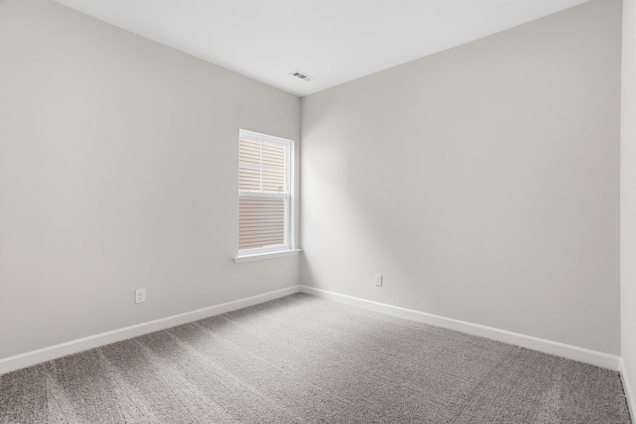 Spacious, unfurnished interior of a new home in Renaissance at White Oak, Garner (Image 30).