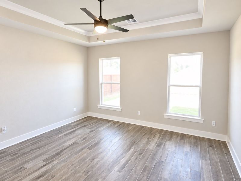 DSLD HOMES NEW CONSTRUCTION MOVE IN READY HOME IN LONGLEAF COMMUNITY LOCATED IN LUMBERTON, TX - Primary bedroom