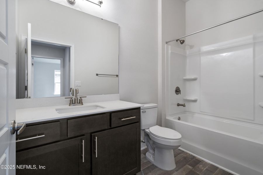 Furnished interior view inside a new home in Shadow Crest at Rolling Hills, Green Cove Springs (Image 8).