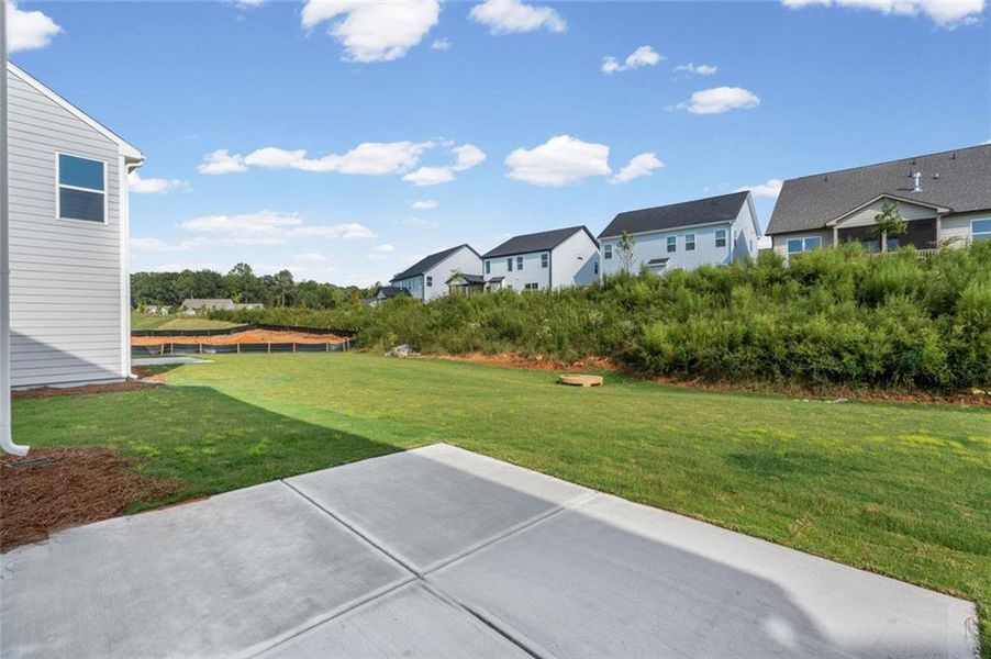 Exterior details and patio area of a home in Twin Lakes, Hoschton (Image 4).