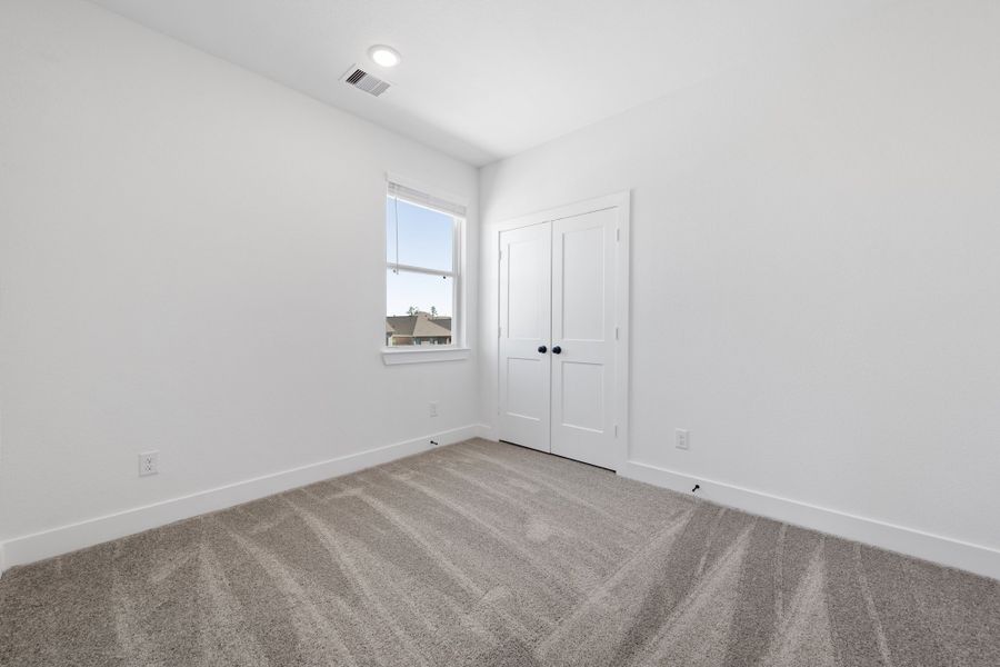 Representative unfurnished interior of a home built from the Dillon – Courtyard Collection by Chesmar Homes in Jordan Ranch, Pattison (Image 15). Representative unfurnished interior of a home built from the Dillon – Courtyard Collection by Chesmar Homes in Jordan Ranch, Pattison (Image 15).