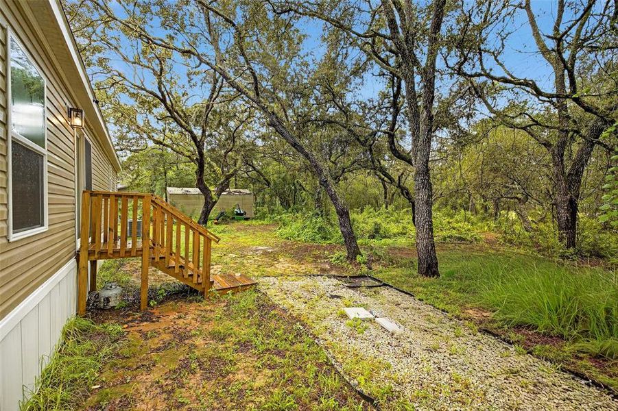 Front exterior of a new home in , Spring Hill, FL, highlighting curb appeal (Image 21). Front exterior of a new home in , Spring Hill, FL, highlighting curb appeal (Image 21).