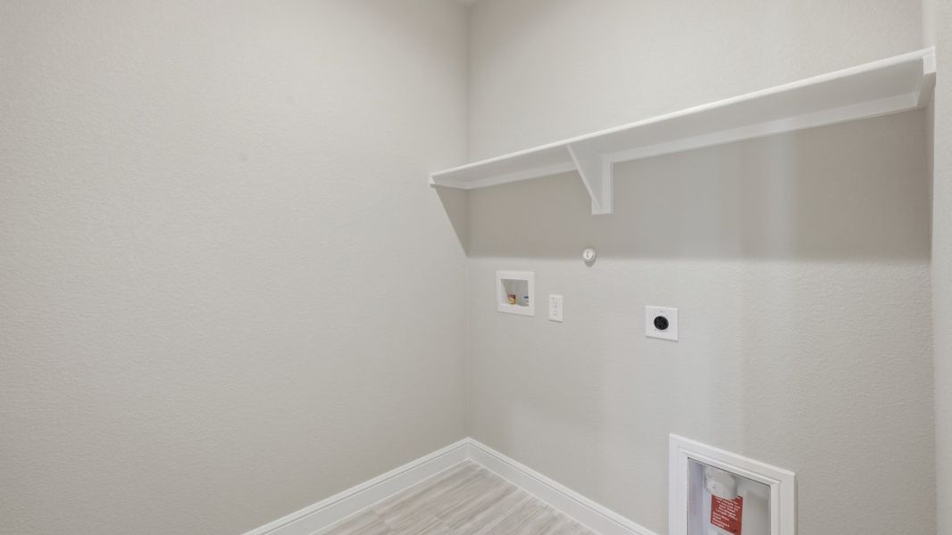 Representative unfurnished interior of a home built from the BASSWOOD by D.R. Horton in Treeline, Justin (Image 37).