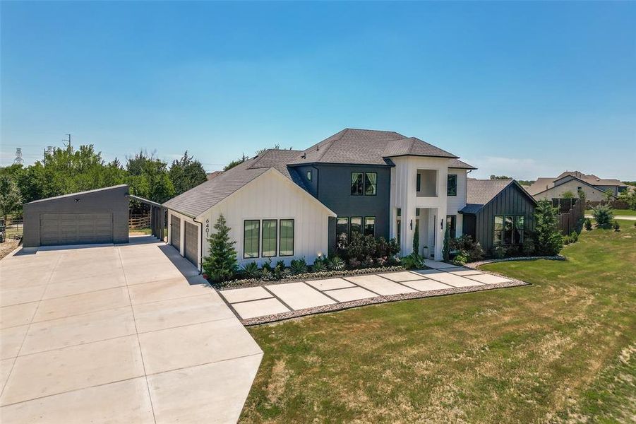 Front exterior of a new home in , Garland, TX, highlighting curb appeal (Image 23). Front exterior of a new home in , Garland, TX, highlighting curb appeal (Image 23).