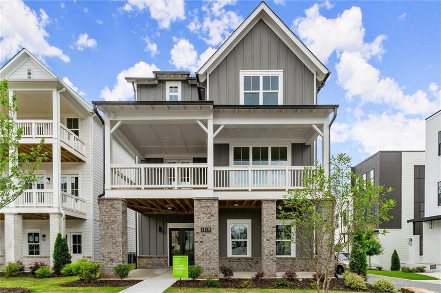 Front exterior of a new home in West Town, Atlanta, GA, highlighting curb appeal (Image 23). Front exterior of a new home in West Town, Atlanta, GA, highlighting curb appeal (Image 23).