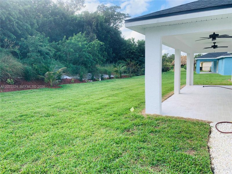 Exterior details and patio area of a home in , Lake Placid (Image 4).