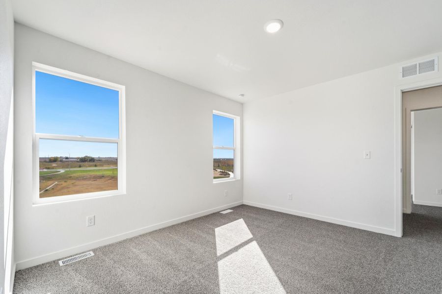 Spacious, unfurnished interior of a new home in Granary, Johnstown (Image 18).