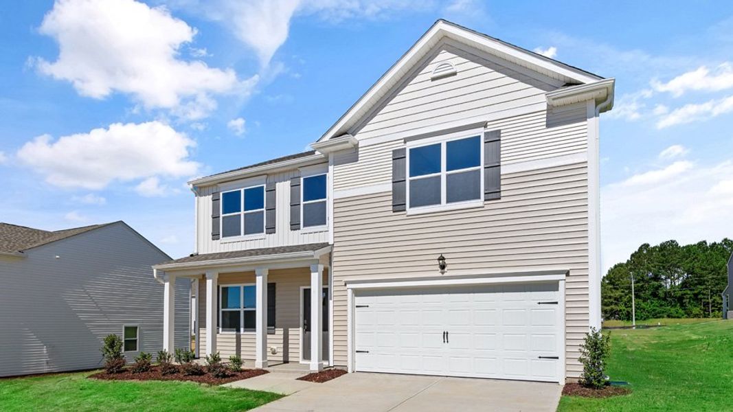 Front exterior of a new home in Ridgewood Farms, Winterville, NC, highlighting curb appeal (Image 19).