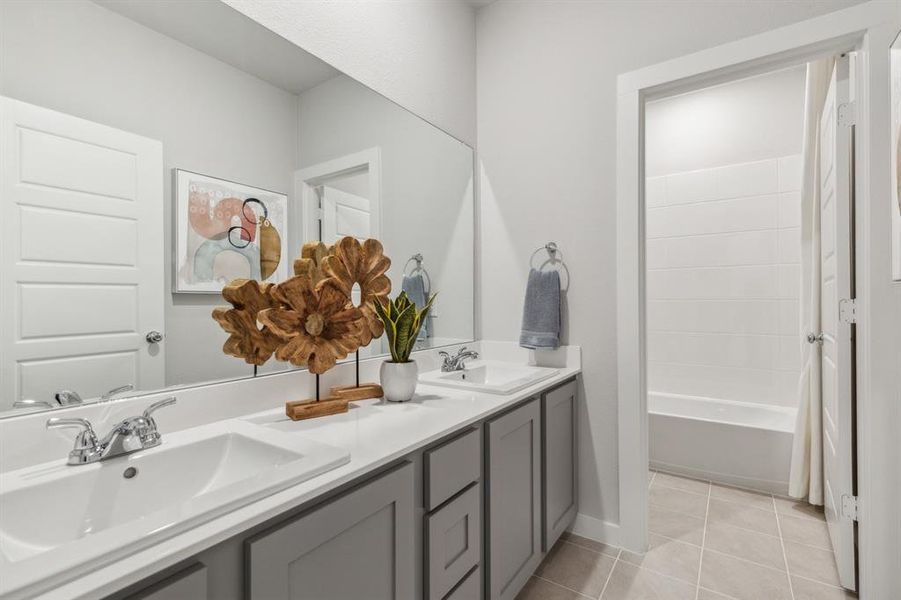 Bathroom in the Winters home plan by Trophy Signature Homes  REPRESENTATIVE PHOTO