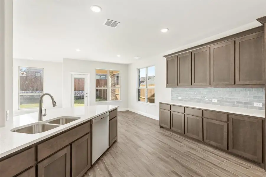 Furnished interior view inside a new home in Homestead at Daniel Farms, DeSoto (Image 7).
